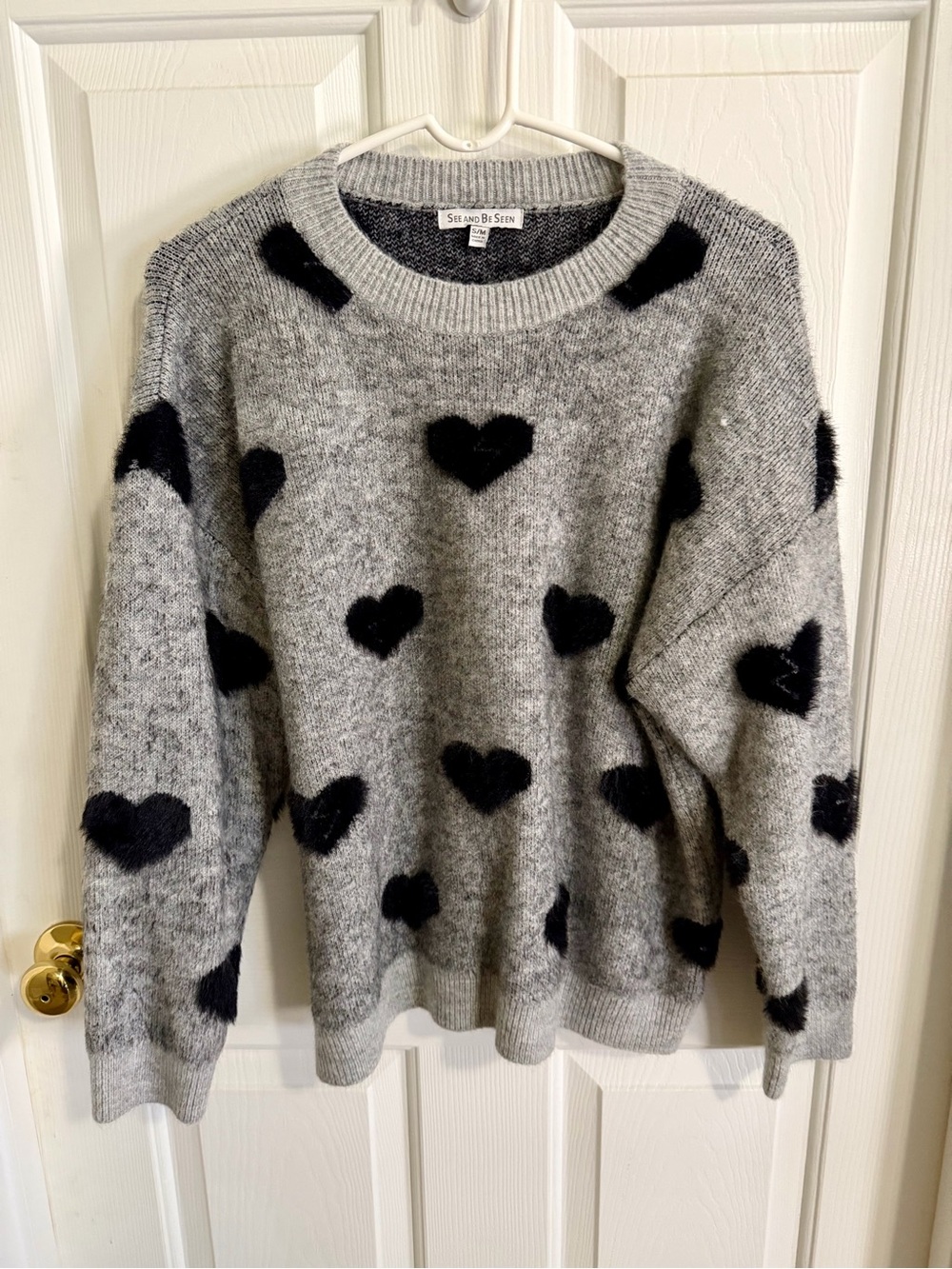 See and Be Seen Grey Crewneck Sweater with Black Heart Motif